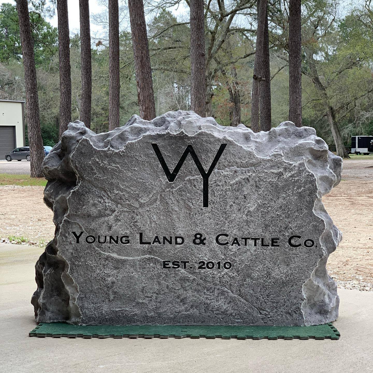 Custom commercial sign made of cultured stone in Houston by Bedrock Boulders