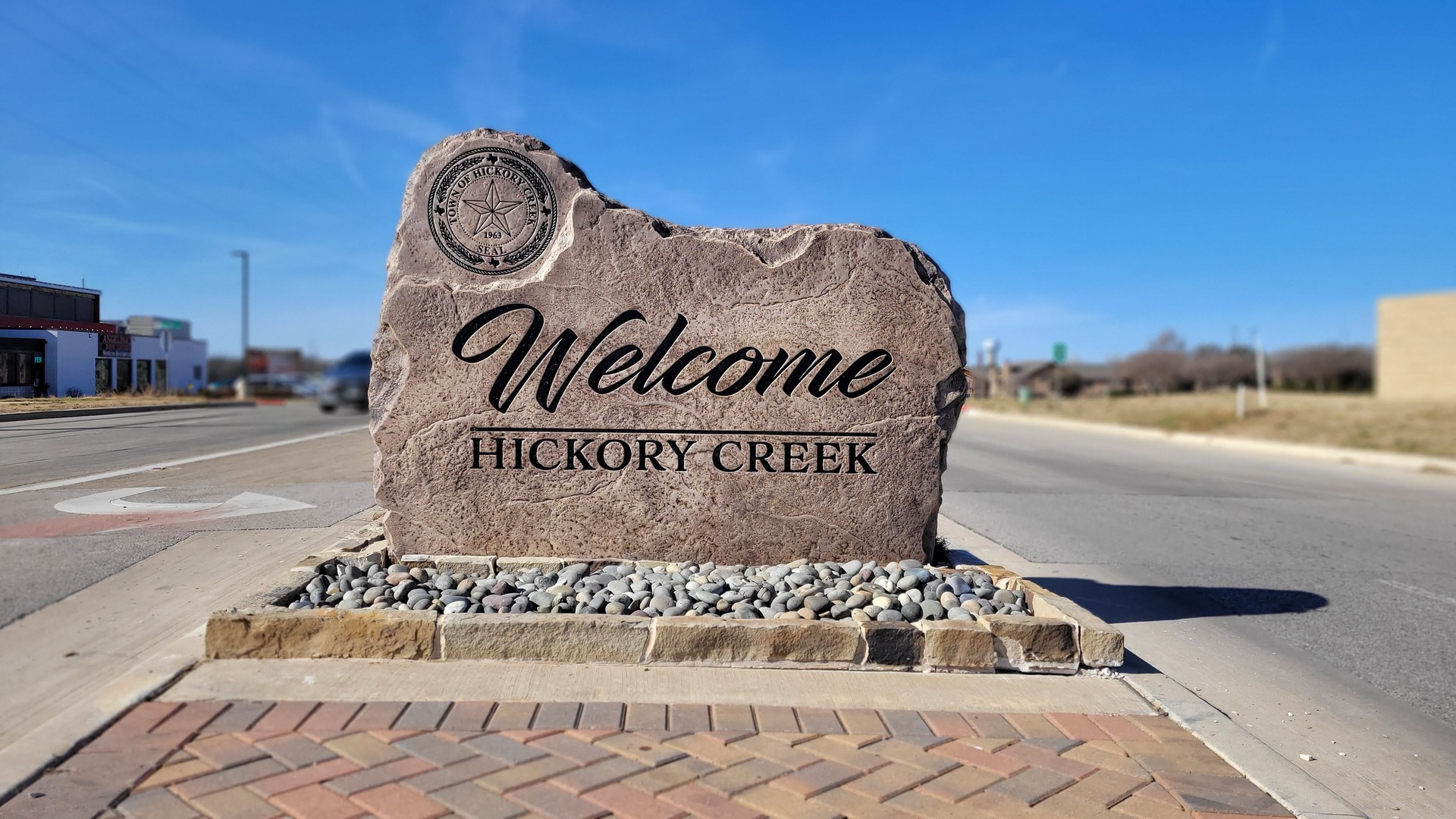 Custom commercial sign made of cultured stone in Houston by Bedrock Boulders