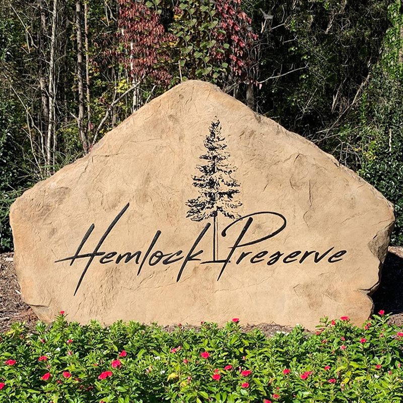 Custom commercial sign made of cultured stone in Houston by Bedrock Boulders