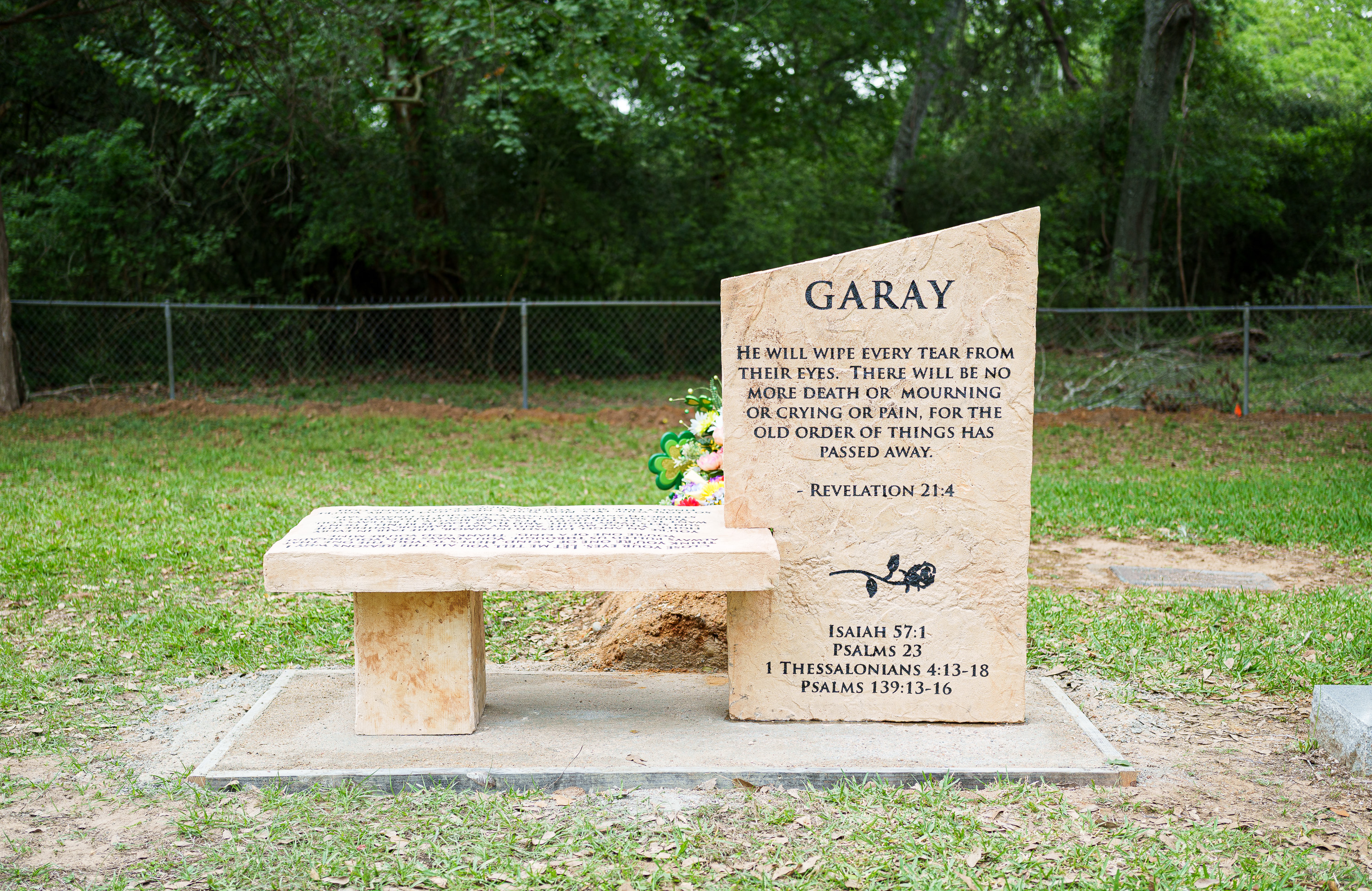 Custom headstone made of cultured stone in Houston by Bedrock Boulders