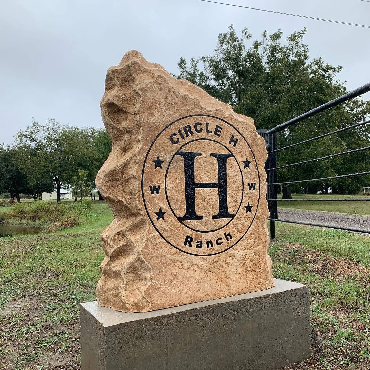 Custom ranch sign made of cultured stone in Houston by Bedrock Boulders