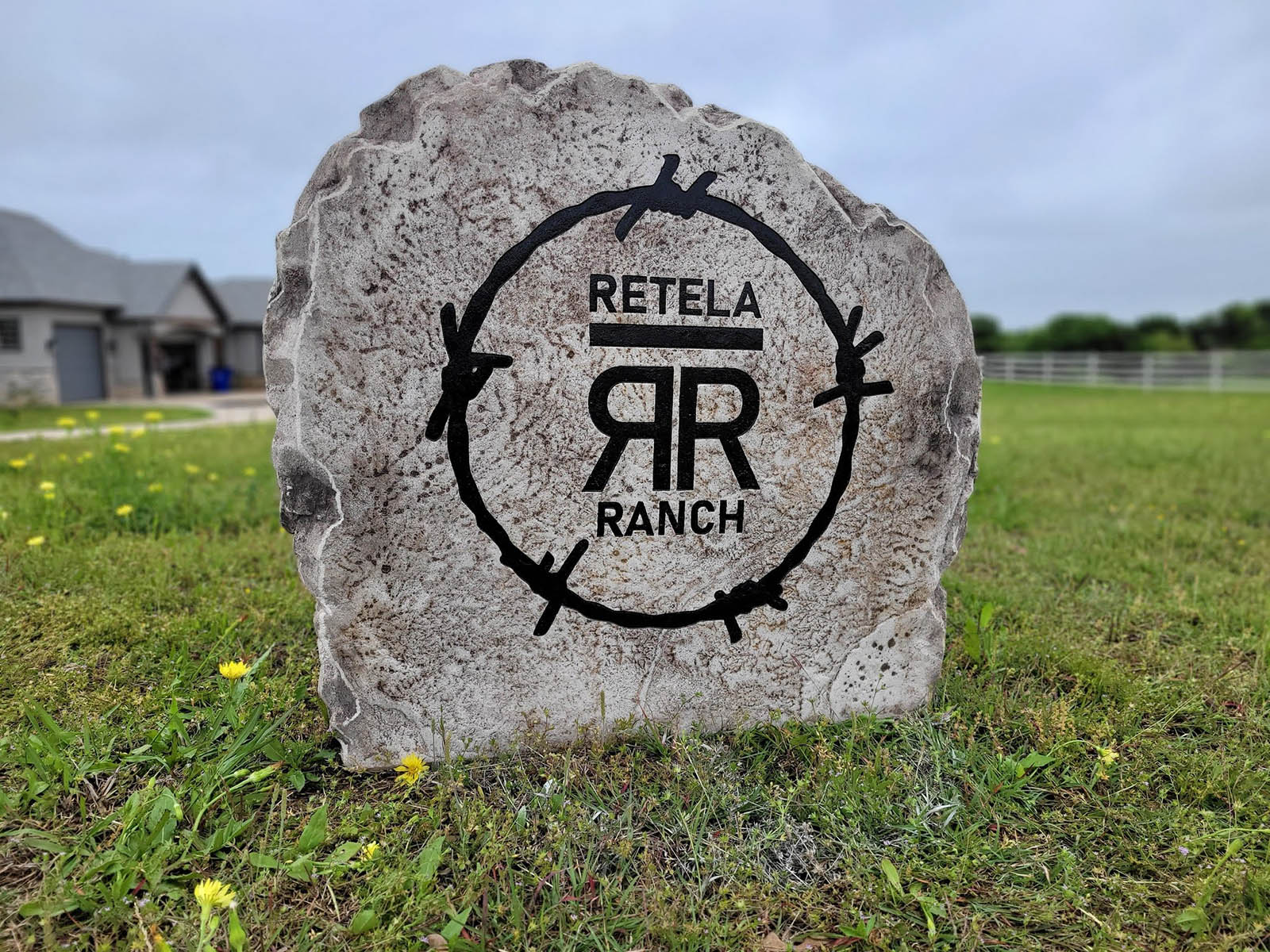 Custom ranch sign made of cultured stone in Houston by Bedrock Boulders