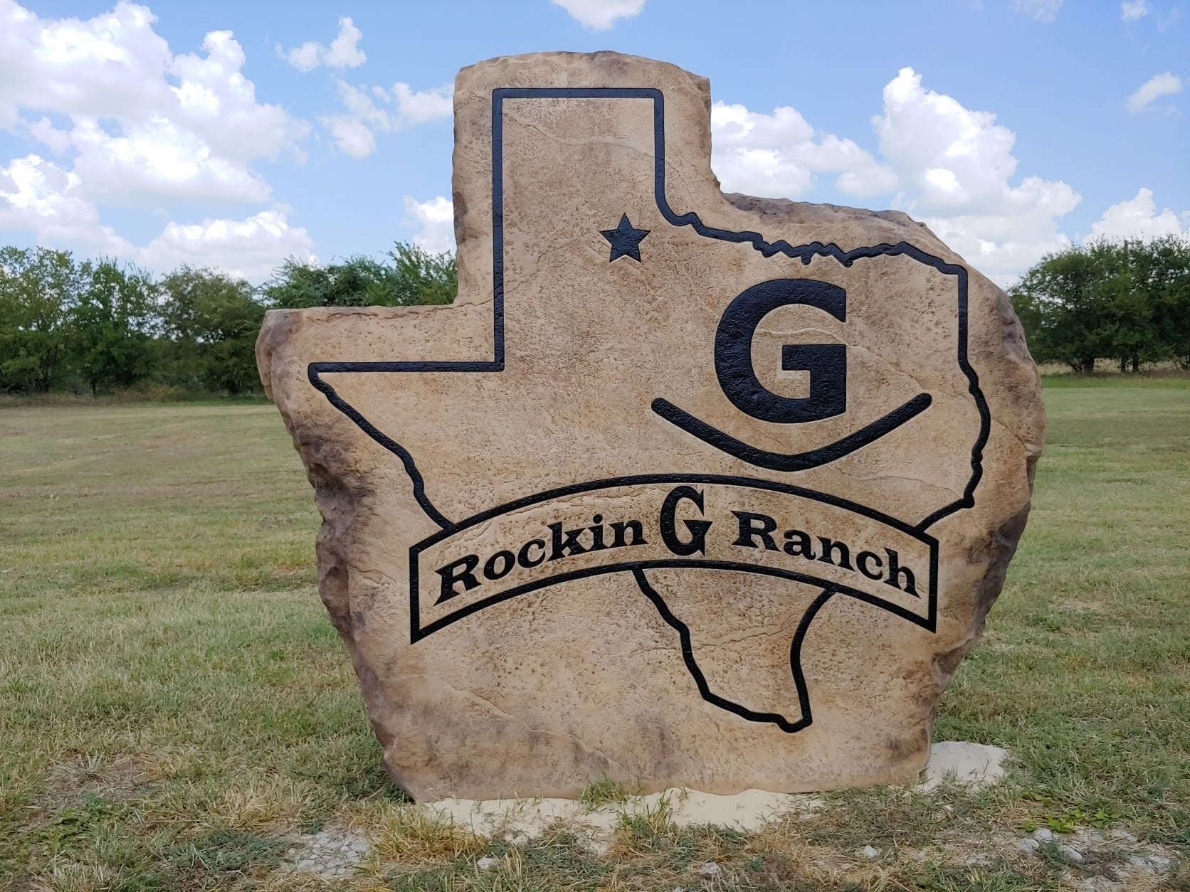 Custom ranch sign made of cultured stone in Houston by Bedrock Boulders